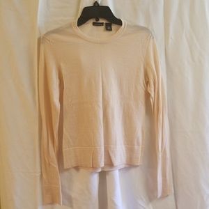 Soft wool cream sweater.
